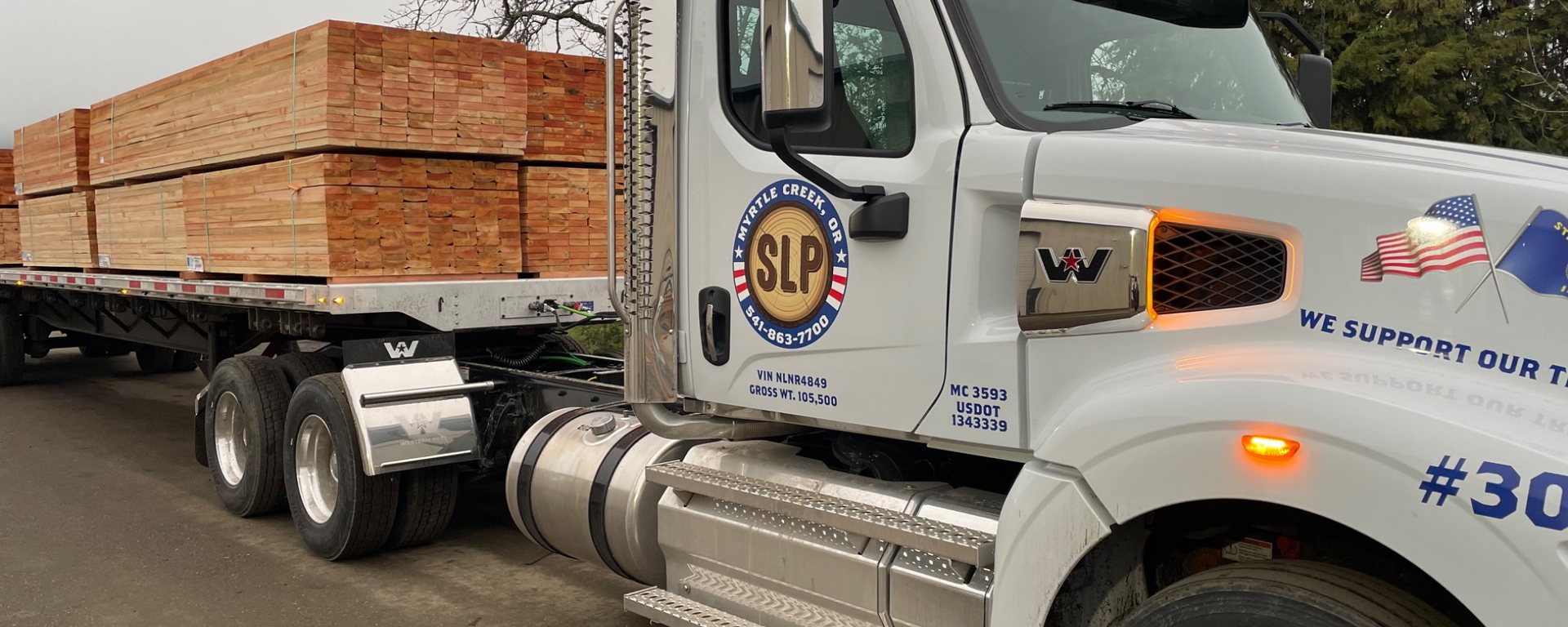 Sawtooth Lumber delivery truck carrying Douglas fir